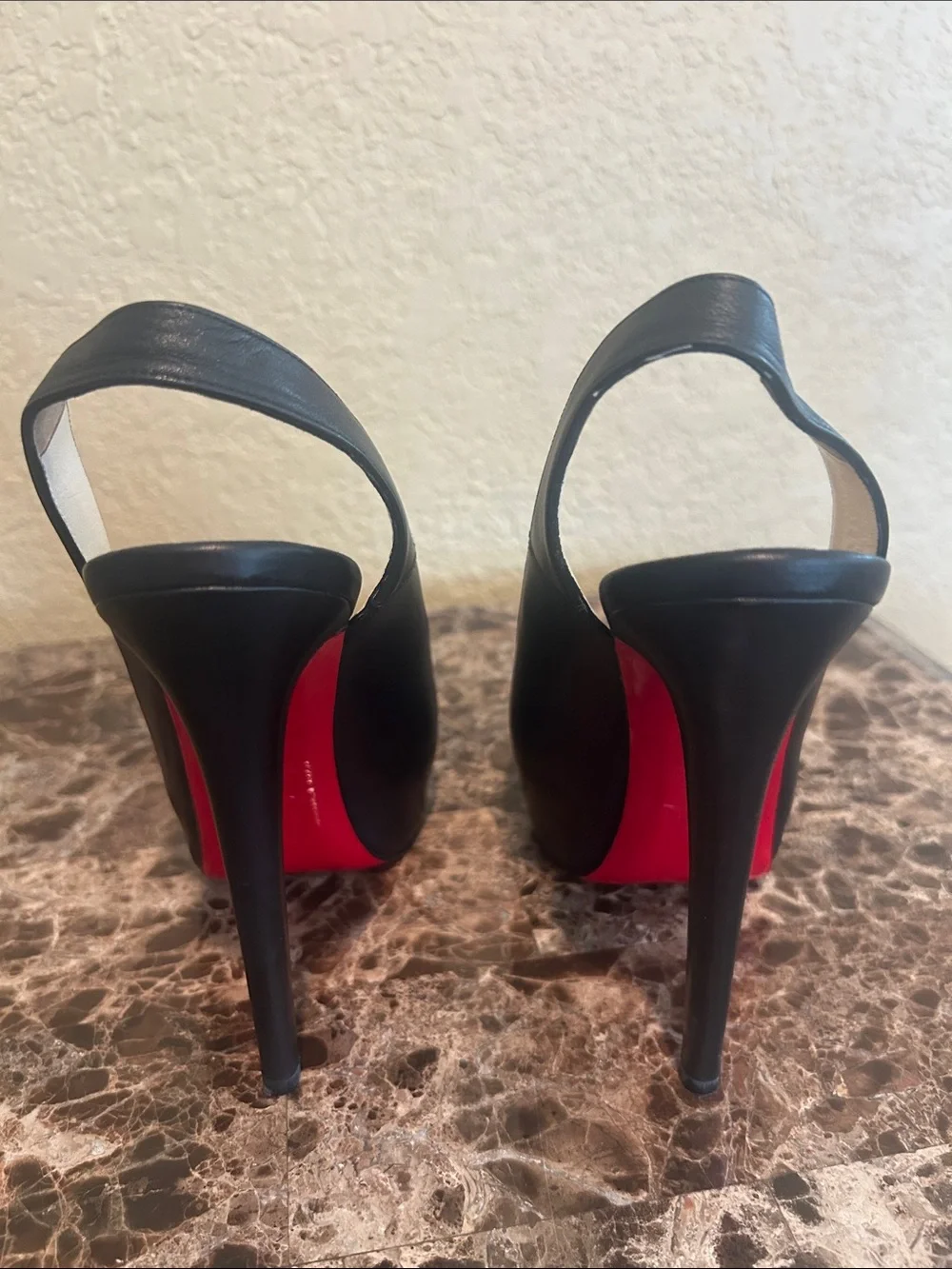 Christian Louboutin lacquered heel